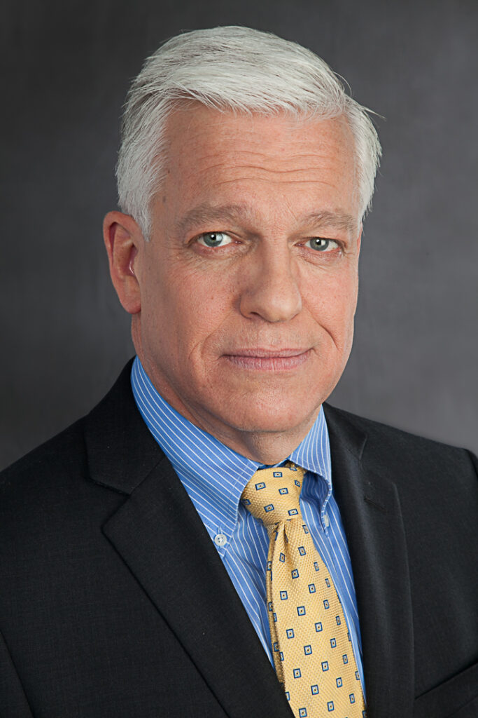 Headshot of a middle aged male financial advisor