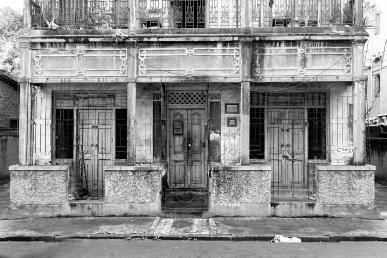 Travel Photographer - black and white photo of house in Kolkata India